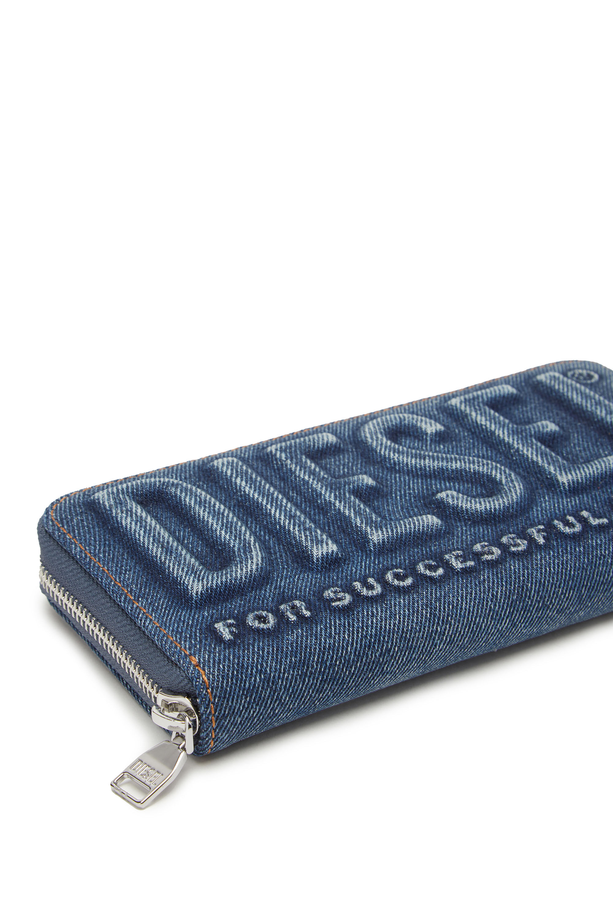CONTINENTAL ZIP L Man: Long zip wallet in logo-embossed denim | Diesel