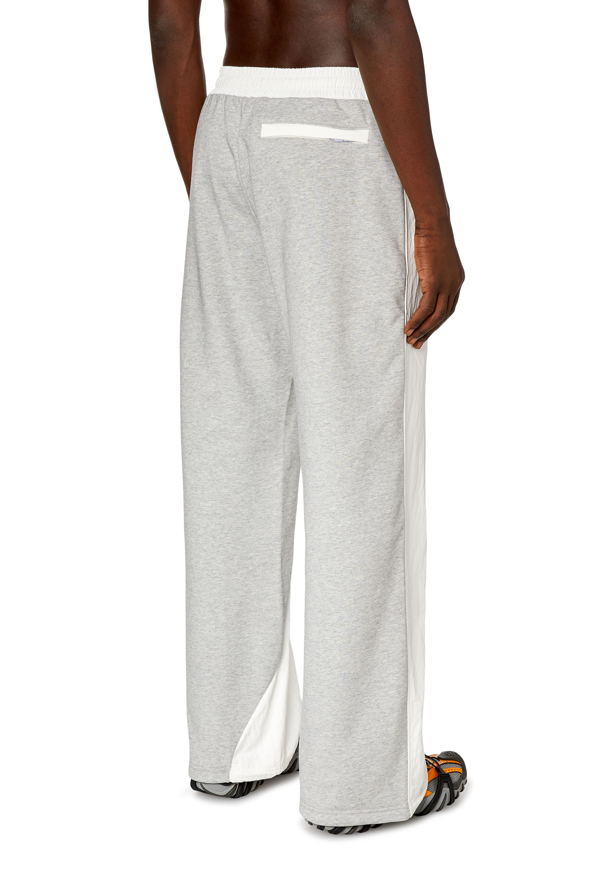 Men's Track pants in crinkled nylon and jersey | Multicolor