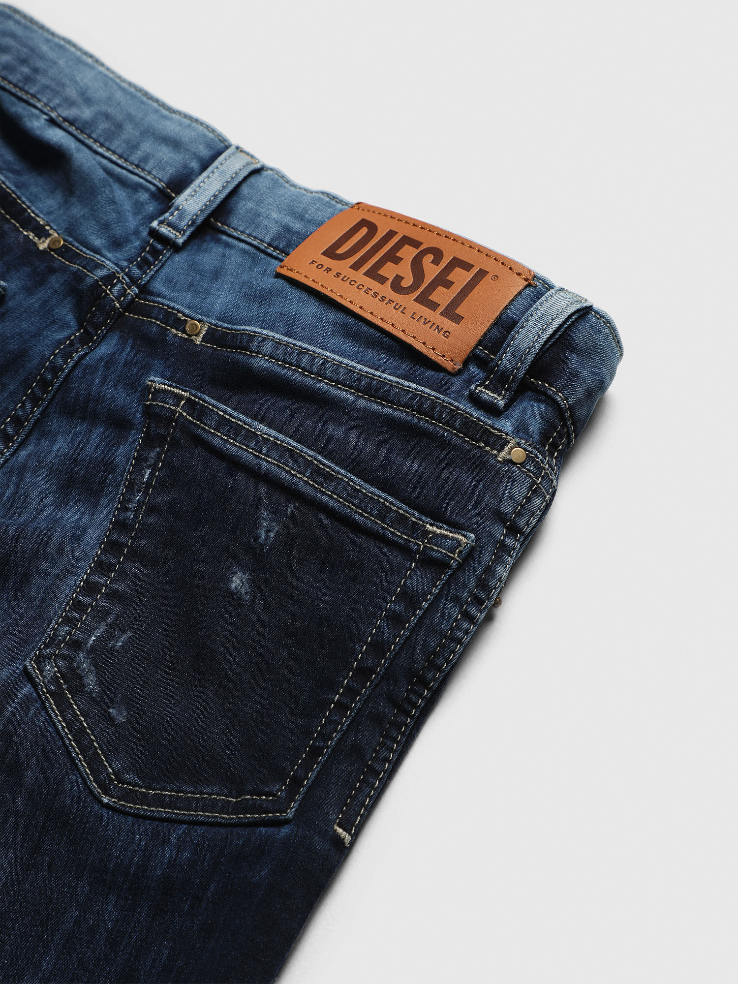 D-EETAR-J Boy: Tapered fit jeans with whiskers | Diesel