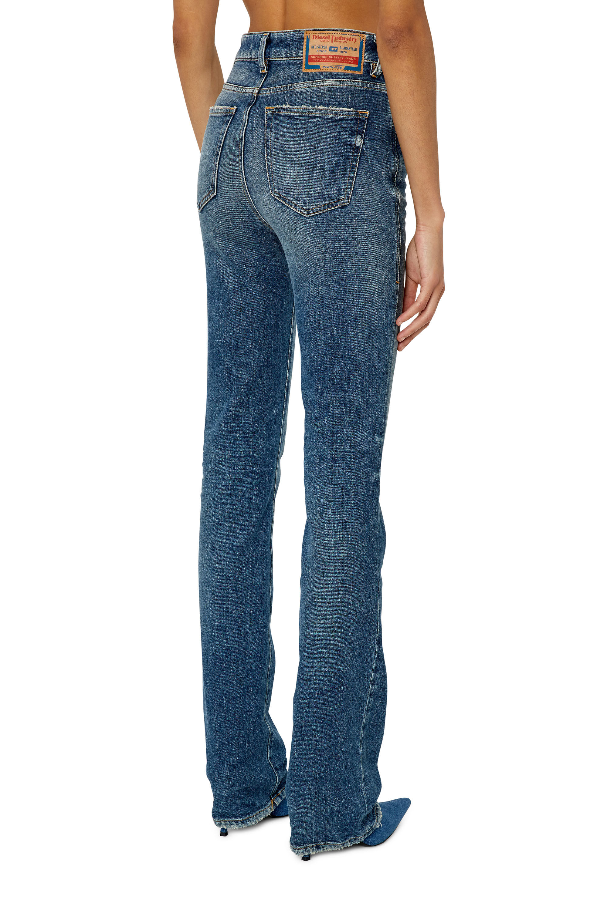2003 D-escription Woman: bootcutandflare Medium blue Jeans | Diesel ®