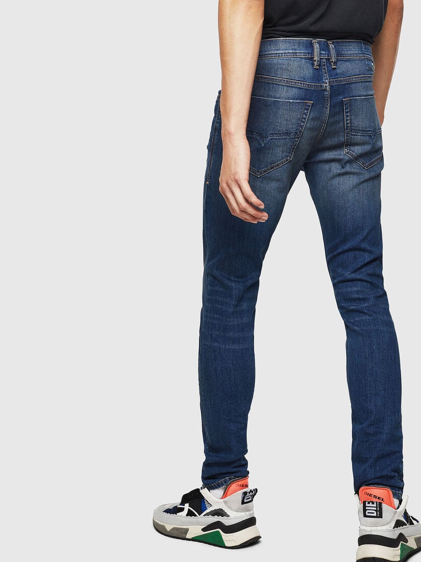 Diesel tepphar slim carrot fit jeans in 089aw medium wash Tepphar 087aw Man Slim Dark Blue Jeans Diesel